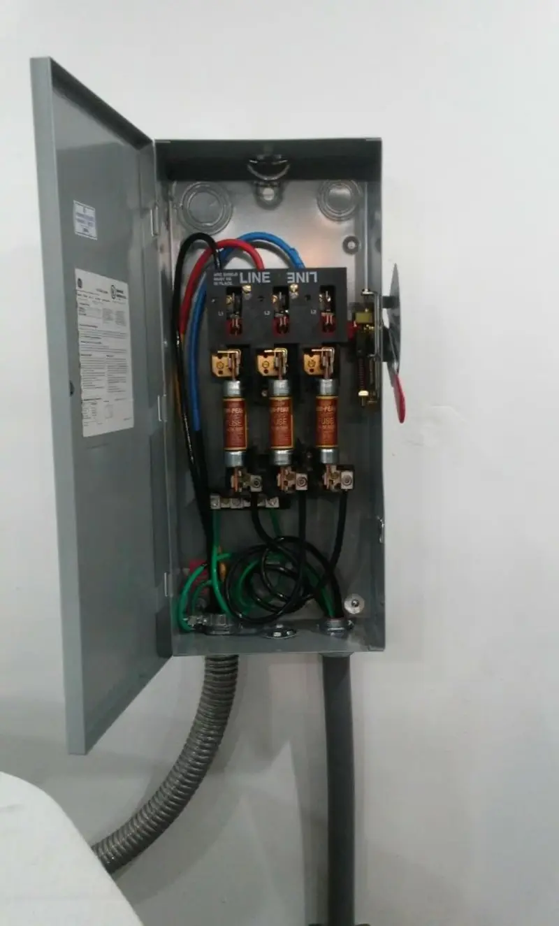 Three-phase disconnect switch installed for Smoke Detector Installation in Bayonne